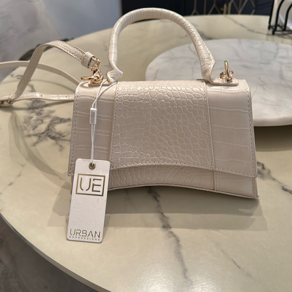 NWT cream colored cross body bag with top handle